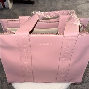 bebe Light Pink Structured Tote with Logo-Embossed Straps